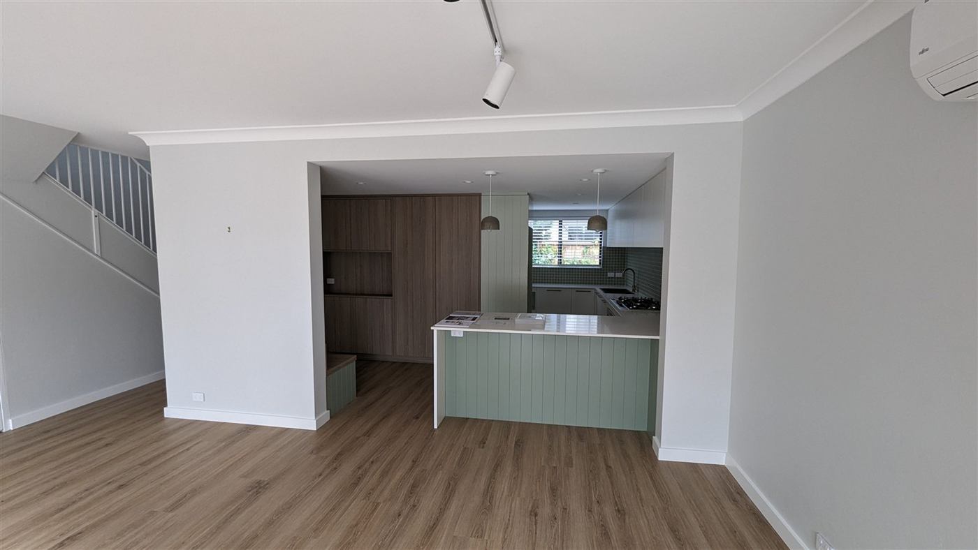 Finished open-plan living and kitchen, Bronte townhouse